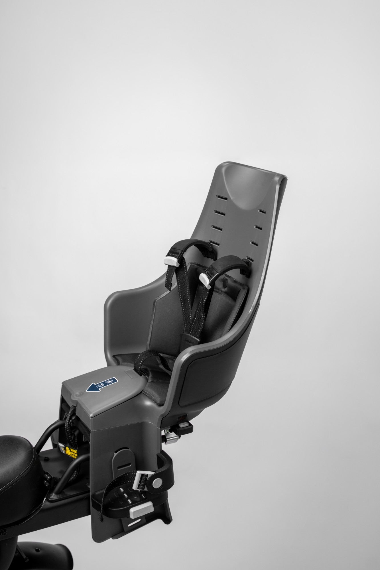Modus baby seat mounted behind the Rolls bench with harness and footrests